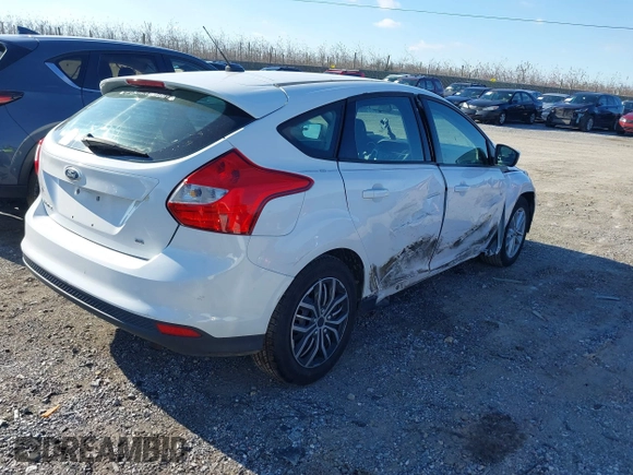 2012 Ford Focus SE z VIN 1FAHP3K29CL265135, wystawiony jako IAAI lot #40989480 z przebiegiem 158 742 mil mil oraz . Historia ofert i sprzedaży dostępna na DreamBid. Obrazek 4.