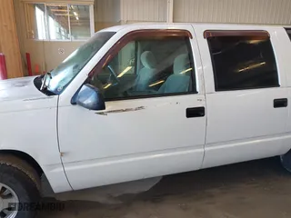 1998 Chevrolet Suburban with VIN 1GNEC16R5WJ358889, listed as a IAAI auction lot 41588573 with 185,298 mi miles. Bid and sale history available at carsss.com. Image 13.