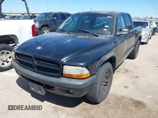 2003 Dodge Dakota Sport with VIN 1D7HL38X63S228581, listed as a IAAI auction lot 41835200 with 273,562 mi miles and . Bid and sale history available at DreamBid. Image 2.