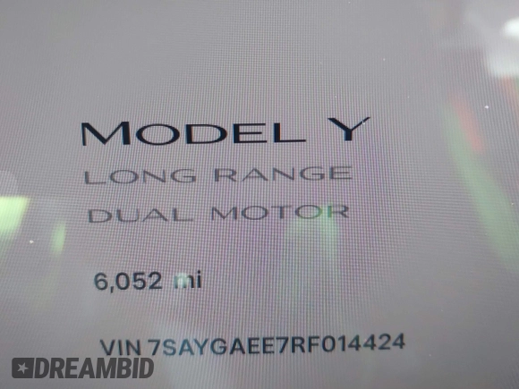 2024 Tesla Model Y Long Range with VIN 7SAYGAEE7RF014424, listed as a IAAI auction lot 41402098 with 6,052 mi miles and . Bid and sale history available at DreamBid. Image 15.