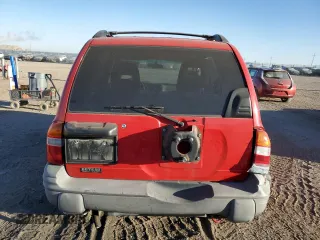 2004 Chevrolet Tracker ZR2 z VIN 2CNBJ734146900024, wystawiony jako Copart lot #76361724 z przebiegiem 90 781 mil mil oraz Czysty tytuł • Clean title. Historia ofert i sprzedaży dostępna na DreamBid. Obrazek 6.