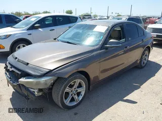 2015 BMW 3 Series 328i with VIN WBA3A5C51FF608143, listed as a IAAI auction lot 42387613 with 92,964 mi miles and . Bid and sale history available at DreamBid. Image 2.