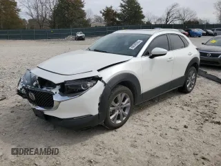 2022 Mazda CX-30 2.5 S Carbon Edition with VIN 3MVDMBCL9NM404733, listed as a Copart auction lot 48546265 with 39,436 mi miles and Salvage Title. Bid and sale history available at carsss.com. Image 1.