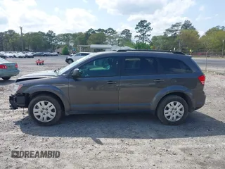 2017 Dodge Journey SE with VIN 3C4PDCABXHT538885, listed as a IAAI auction lot 41919599 with 170,311 mi miles and . Bid and sale history available at DreamBid. Image 14.