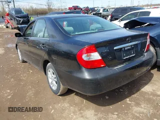 2004 Toyota Camry LE with VIN 4T1BF32KX4U078562, listed as a IAAI auction lot 41849865 with 1 mi miles. Bid and sale history available at carsss.com. Image 3.