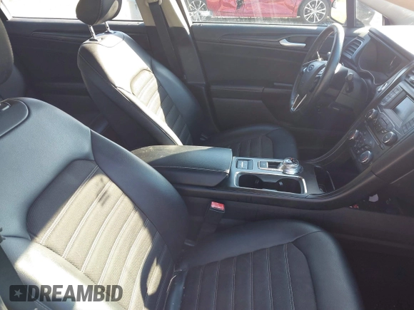2018 Ford Fusion SE with VIN 3FA6P0LU7JR138906, listed as a IAAI auction lot 41573985 with 127,660 mi miles and . Bid and sale history available at DreamBid. Image 5.