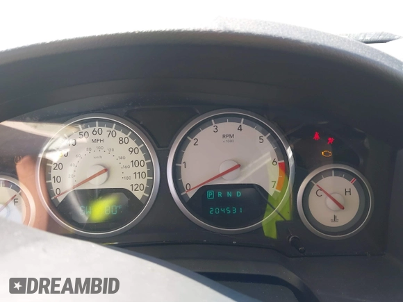 2010 Dodge Grand Caravan SXT with VIN 2D4RN5D1XAR462150, listed as a IAAI auction lot 41466381 with 204,531 mi miles and . Bid and sale history available at DreamBid. Image 7.