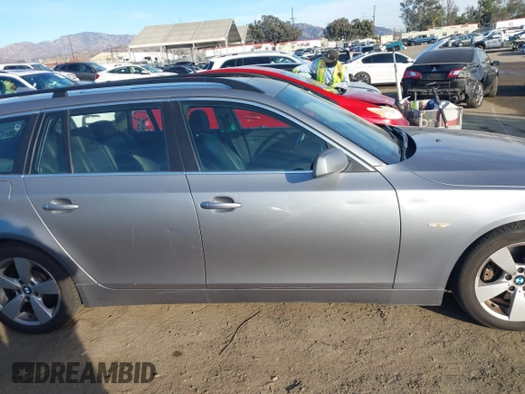 2007 BMW 5 Series 530xi with VIN WBANN73527CN04174, listed as a IAAI auction lot 41401304 with 114,405 mi miles and . Bid and sale history available at DreamBid. Image 13.