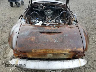 1997 BMW 3 Series Z3 2.8 z VIN 4USCJ3320VLC02817, wystawiony jako Copart lot #69536054 z przebiegiem Nie podano mil oraz Nie do naprawy • Non repairable. Historia ofert i sprzedaży dostępna na DreamBid. Obrazek 10.