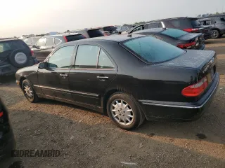 2000 Mercedes-Benz E-Class with VIN WDBJF82J4YX042051, listed as a Copart auction lot 72147904 with 265,886 mi miles and Salvage Title. Bid and sale history available at carsss.com. Image 2.