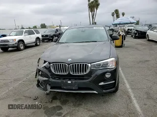 2018 BMW X4 xDrive28i with VIN 5UXXW3C57J0T82047, listed as a Copart auction lot 55988675 with 103,692 mi miles and Salvage title. Bid and sale history available at DreamBid. Image 14.