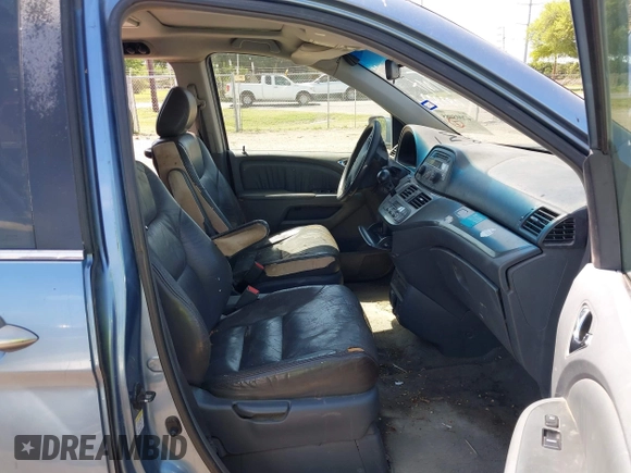 2005 Honda Odyssey EX-L with VIN 5FNRL387X5B083902, listed as a IAAI auction lot 42005085 with 249,861 mi miles. Bid and sale history available at carsss.com. Image 5.