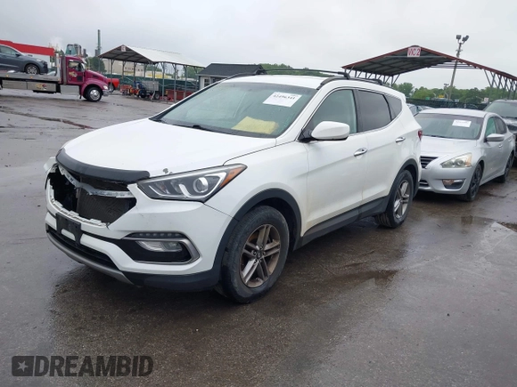 2017 Hyundai Santa Fe 2.4L with VIN 5XYZUDLB0HG397831, listed as a IAAI auction lot 42496341 with 96,333 mi miles and . Bid and sale history available at DreamBid. Image 2.