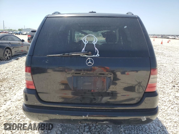 2001 Mercedes-Benz M 320/430/500 z VIN 4JGAB54E81A283210, wystawiony jako Copart lot #52238615 z przebiegiem 176 719 mil mil oraz Szkoda całkowita • Salvage title. Historia ofert i sprzedaży dostępna na DreamBid. Obrazek 6.
