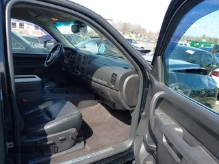 2013 Chevrolet Silverado 1500 LT with VIN 3GCPKSE71DG329253, listed as a IAAI auction lot 41723597 with 164,539 mi miles. Bid and sale history available at carsss.com. Image 5.