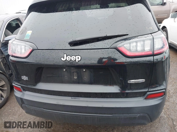 2019 Jeep Cherokee Latitude with VIN 1C4PJLCB4KD220229, listed as a IAAI auction lot 41179101 with 63,099 mi miles and . Bid and sale history available at DreamBid. Image 16.