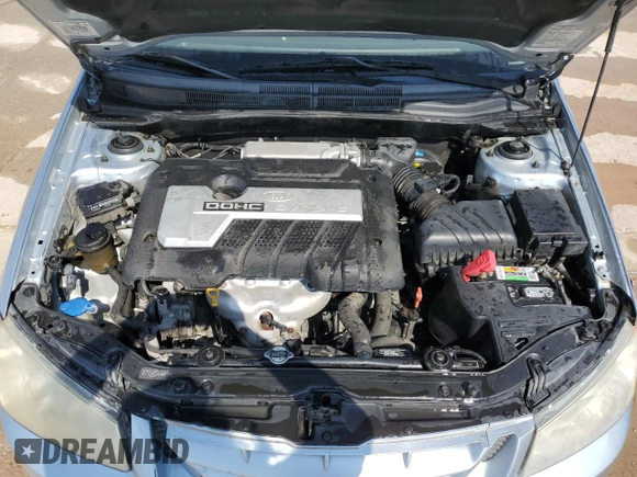 2006 Kia Spectra EX with VIN KNAFE121865277527, listed as a Copart auction lot 74613214 with 123,368 mi miles and Salvage Title. Bid and sale history available at carsss.com. Image 11.