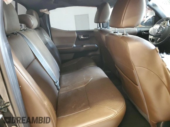 2018 Toyota Tacoma SR5 z VIN 3TMEZ5CN3JM072275, wystawiony jako Copart lot #56141695 z przebiegiem Nie podano mil oraz Czysty tytuł • Clean title. Historia ofert i sprzedaży dostępna na DreamBid. Obrazek 10.