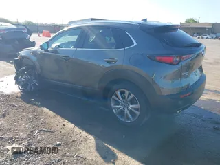 2022 Mazda CX-30 S Premium with VIN 3MVDMBDL0NM413867, listed as a IAAI auction lot 42082560 with 12,375 mi miles and . Bid and sale history available at DreamBid. Image 3.