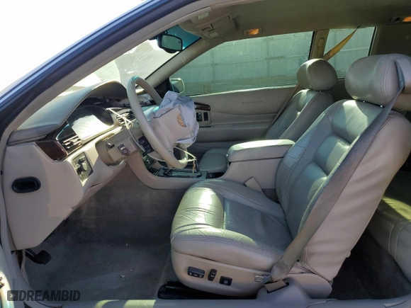 2000 Cadillac Eldorado with VIN 1G6EL12Y5YU176121, listed as a Copart auction lot 77123914 with 91,663 mi miles and Salvage Title. Bid and sale history available at carsss.com. Image 7.