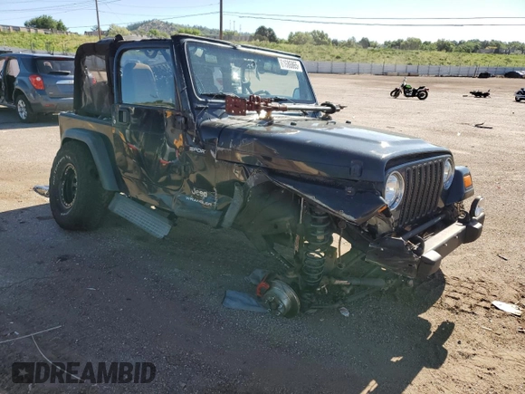 2004 Jeep Wrangler Sport with VIN 1J4FA49S04P751464, listed as a Copart auction lot 61686865 with Not provided miles and Salvage title. Bid and sale history available at DreamBid. Image 4.