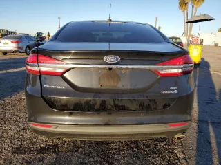 2018 Ford Fusion Hybrid SE with VIN 3FA6P0LU8JR211748, listed as a Copart auction lot 38046363 with 76,044 mi miles. Bid and sale history available at carsss.com. Image 6.