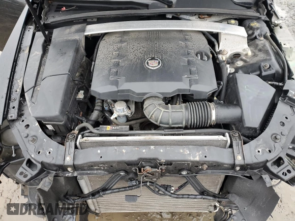 2012 Cadillac CTS Performance z VIN 1G6DJ1E38C0158018, wystawiony jako Copart lot #43171545 z przebiegiem 57 444 mil mil oraz Szkoda całkowita • Salvage title. Historia ofert i sprzedaży dostępna na DreamBid. Obrazek 11.