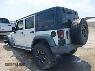 2012 Jeep Wrangler Unlimited Sport with VIN 1C4BJWDG7CL273102, listed as a IAAI auction lot 42288975 with 155,153 mi miles and . Bid and sale history available at DreamBid. Image 3.