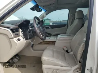 2015 GMC Yukon XL Denali z VIN 1GKS1JKJ7FR552458, wystawiony jako Copart lot #48248655 z przebiegiem 162 798 mil mil oraz Szkody całkowita. Historia ofert i sprzedaży dostępna na DreamBid. Obrazek 7.
