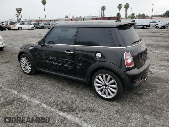 2012 MINI Hardtop S with VIN WMWSV3C52CTY17540, listed as a Copart auction lot 64137185 with 115,542 mi miles and Salvage title. Bid and sale history available at DreamBid. Image 2.