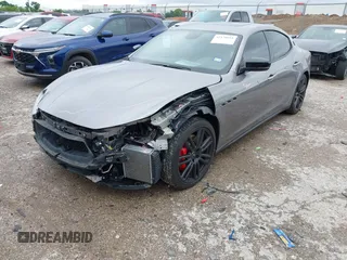 2021 Maserati Ghibli S Q4 with VIN ZAM57YTA8M1368703, listed as a IAAI auction lot 42170551 with 29,969 mi miles and . Bid and sale history available at DreamBid. Image 18.