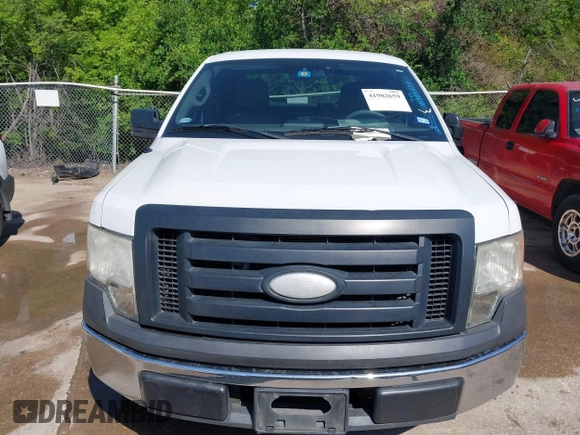 2009 Ford F-150 STX with VIN 1FTRX12W89KC52056, listed as a IAAI auction lot 41982659 with 318,539 mi miles. Bid and sale history available at carsss.com. Image 6.