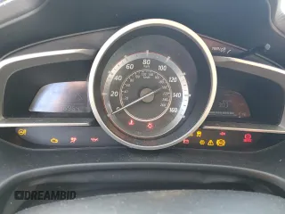 2016 Mazda 3 i Touring z VIN JM1BM1W70G1299548, wystawiony jako Copart lot #52575085 z przebiegiem 136 964 mil mil oraz Szkoda całkowita • Salvage title. Historia ofert i sprzedaży dostępna na DreamBid. Obrazek 9.