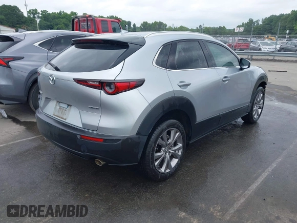 2021 Mazda CX-30 Premium with VIN 3MVDMADL7MM252507, listed as a IAAI auction lot 42338625 with 44,537 mi miles and . Bid and sale history available at DreamBid. Image 4.