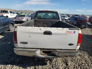 1999 Ford F-150 z VIN 1FTRF18W1XKA87801, wystawiony jako Copart lot #79094454 z przebiegiem Nie podano mil oraz Szkoda całkowita • Salvage title. Historia ofert i sprzedaży dostępna na DreamBid. Obrazek 10.