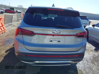 2021 Hyundai Santa Fe SEL z VIN 5NMS24AJ1MH356058, wystawiony jako IAAI lot #41800474 z przebiegiem 82 438 mil mil oraz . Historia ofert i sprzedaży dostępna na DreamBid. Obrazek 17.