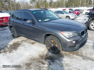 2015 BMW X1 xDrive28i with VIN WBAVL1C59FVY40894, listed as a IAAI auction lot 41623147 with NaN miles. Bid and sale history available at carsss.com. Image 1.