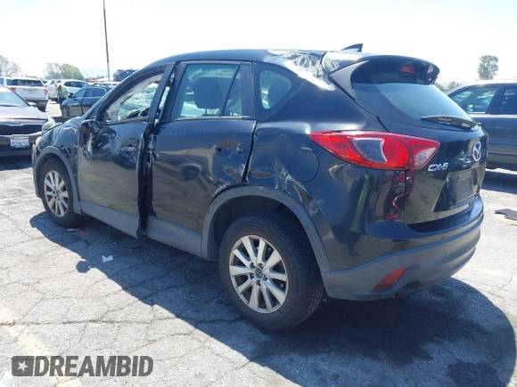 2016 Mazda CX-5 Sport with VIN JM3KE2BY4G0807776, listed as a IAAI auction lot 42206641 with 136,809 mi miles and . Bid and sale history available at DreamBid. Image 3.