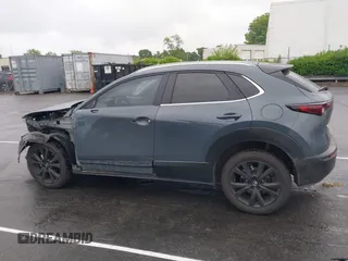 2023 Mazda CX-30 S Carbon Edition with VIN 3MVDMBCM9PM574358, listed as a IAAI auction lot 42105931 with 55,975 mi miles and . Bid and sale history available at DreamBid. Image 15.