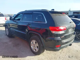 2014 Jeep Grand Cherokee Laredo with VIN 1C4RJEAG4EC136764, listed as a IAAI auction lot 41817676 with 133,943 mi miles. Bid and sale history available at carsss.com. Image 3.