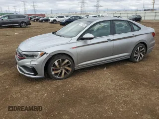 2019 Volkswagen Jetta GLI S with VIN 3VW5T7BUXKM193714, listed as a Copart auction lot 52259055 with 49,283 mi miles and Salvage title. Bid and sale history available at DreamBid. Image 1.