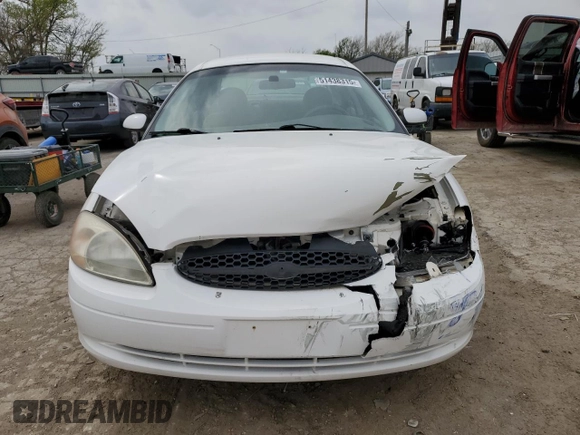2002 Ford Taurus SE Standard с VIN 1FAFP53U02A133605, выставлен на аукционе Copart как лот 51438315 с пробегом 135 602 миль миль и Списание • Salvage title. История ставок и продаж доступна на DreamBid. Изображение 5.
