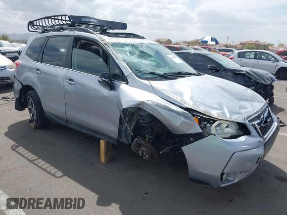 2014 Subaru Forester XT Touring with VIN JF2SJGPC2EH458390, listed as a IAAI auction lot 41923959 with 113,170 mi miles and . Bid and sale history available at DreamBid. Image 1.