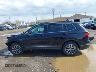 2020 Volkswagen Tiguan SE with VIN 3VV2B7AX5LM091857, listed as a IAAI auction lot 41922727 with 83,464 mi miles and . Bid and sale history available at DreamBid. Image 14.