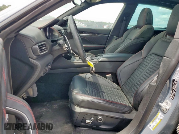 2023 Maserati Levante with VIN ZN661YUM5PX411140, listed as a Copart auction lot 65411165 with 12,053 mi miles and Salvage title. Bid and sale history available at DreamBid. Image 7.