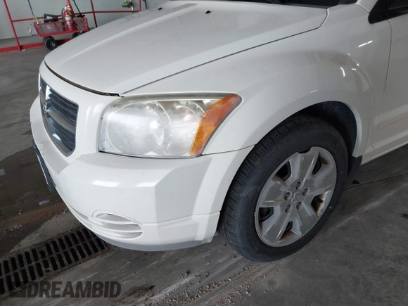 2007 Dodge Caliber SXT with VIN 1B3HB48B47D540482, listed as a IAAI auction lot 41942169 with 194,573 mi miles and . Bid and sale history available at DreamBid. Image 6.