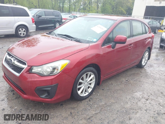 2012 Subaru Impreza Premium with VIN JF1GPAC60CH229287, listed as a IAAI auction lot 42209207 with 115,125 mi miles and . Bid and sale history available at DreamBid. Image 2.