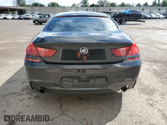 2017 BMW 6 Series z VIN WBA6D2C31HGT73273, wystawiony jako Copart lot #67705734 z przebiegiem 75 080 mil mil oraz Szkoda całkowita • Salvage title. Historia ofert i sprzedaży dostępna na DreamBid. Obrazek 6.