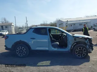 2024 Hyundai Santa Cruz SEL z VIN 5NTJBDAE3RH088530, wystawiony jako IAAI lot #41785149 z przebiegiem 21 560 mil mil oraz . Historia ofert i sprzedaży dostępna na DreamBid. Obrazek 13.