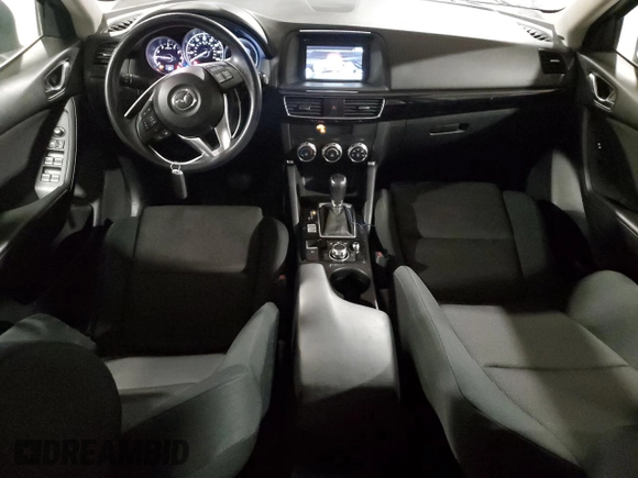 2016 Mazda CX-5 Sport with VIN JM3KE4BY9G0786547, listed as a Copart auction lot 60169155 with 151,599 mi miles and Clean title. Bid and sale history available at DreamBid. Image 8.